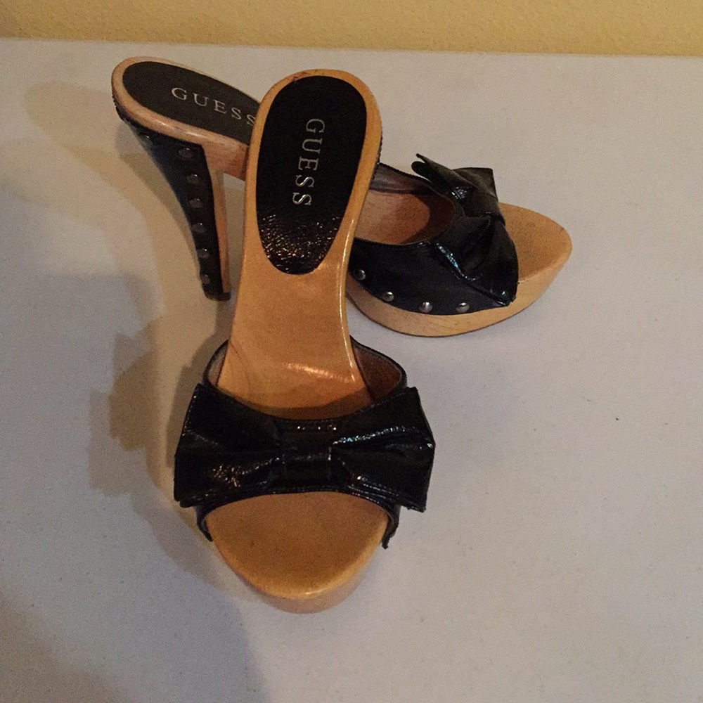 Guess stilettos black and wood with bows.